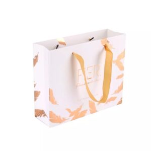 white kraft paper bag with ribbon handle