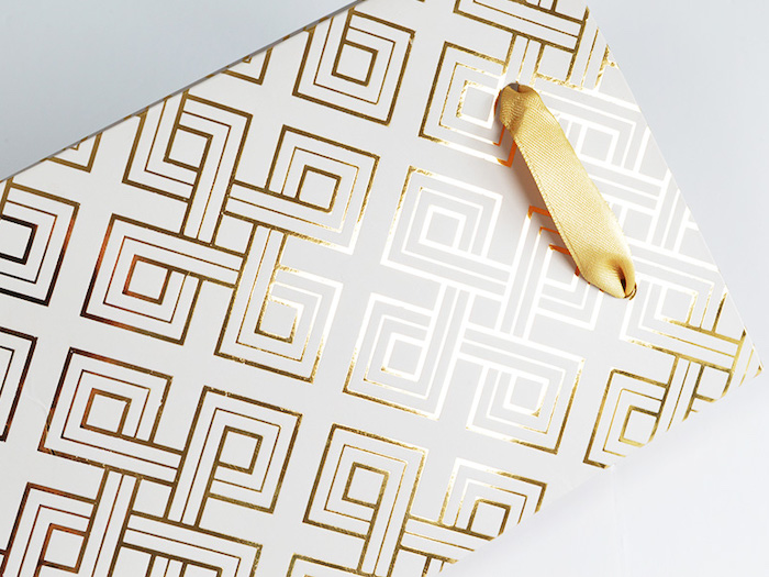 Custom made white and gold ribbon handle paper bag