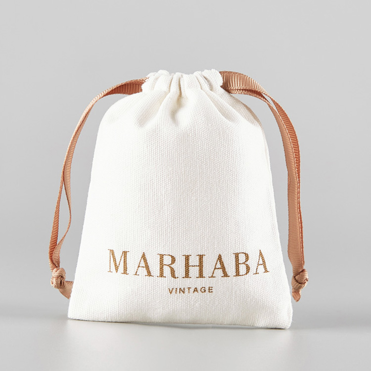 bespoke cotton drawstring bags with rose gold ribbon