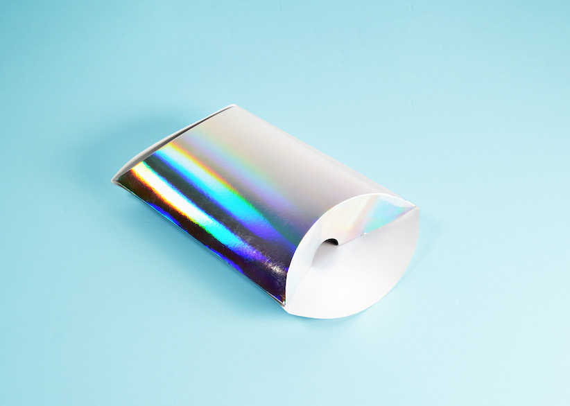 custom made holographic pillow box on blue background